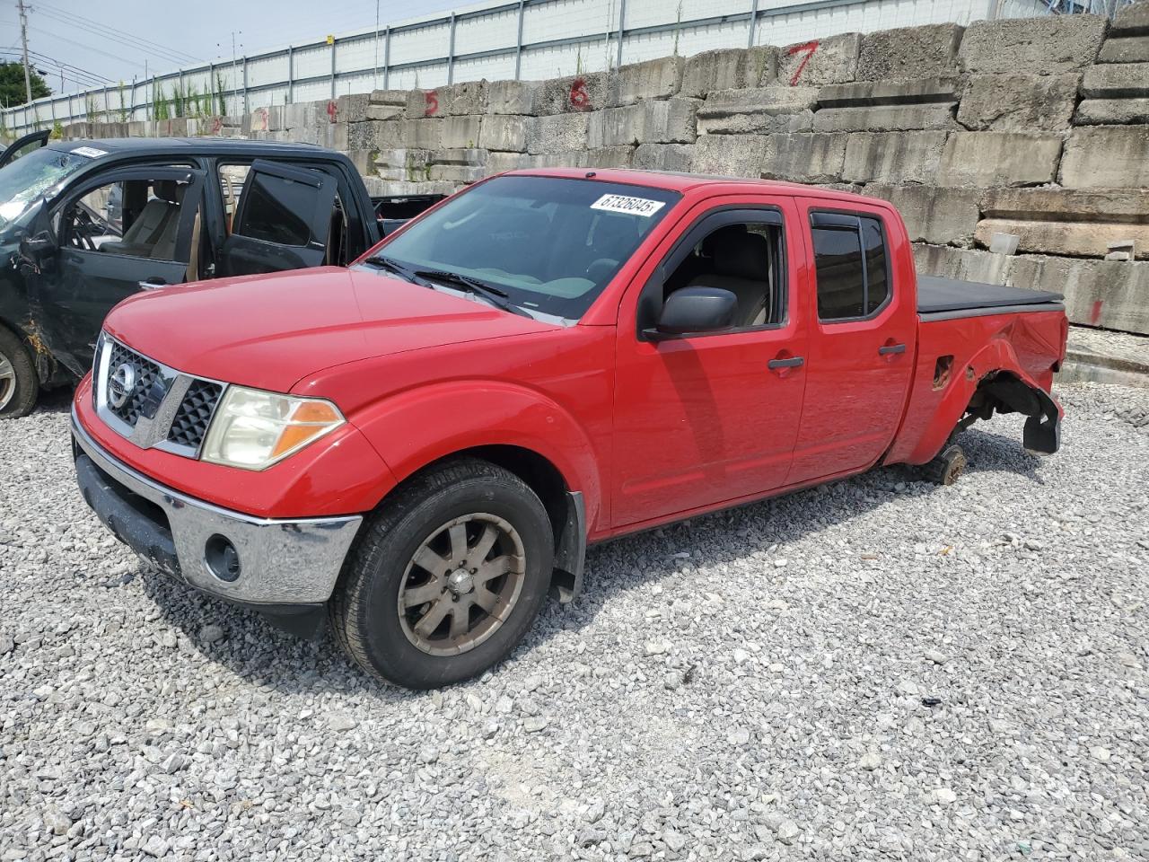 2007 Nissan Frontier crew cab le