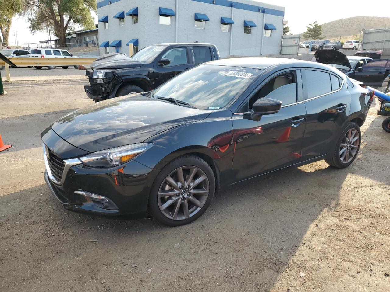 2018 Mazda 3 grand to GRAND TOURING