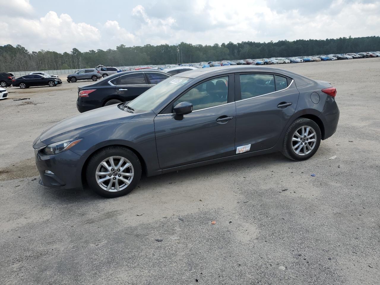 2014 Mazda 3 grand to GRAND TOURING