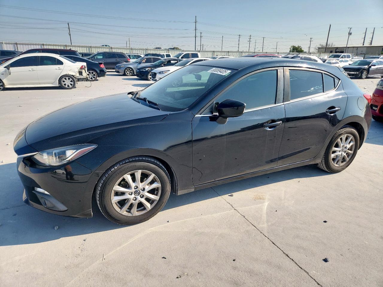 2015 Mazda 3 grand to GRAND TOURING